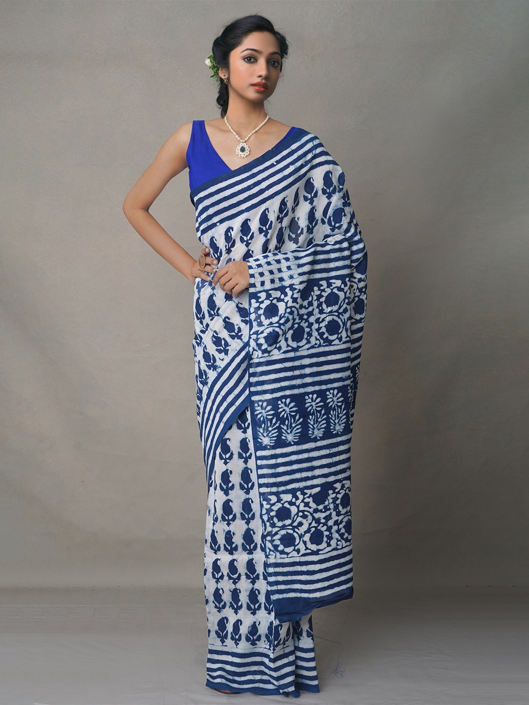 

Unnati Silks Blue & White Ethnic Motifs Silk Cotton Chanderi Saree