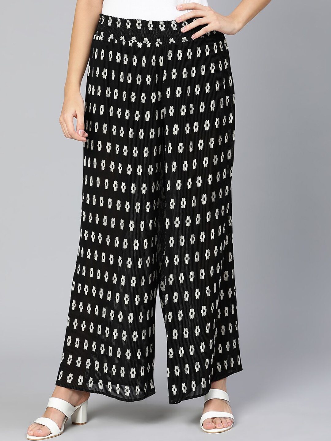 

Oxolloxo Women Black Printed Trousers