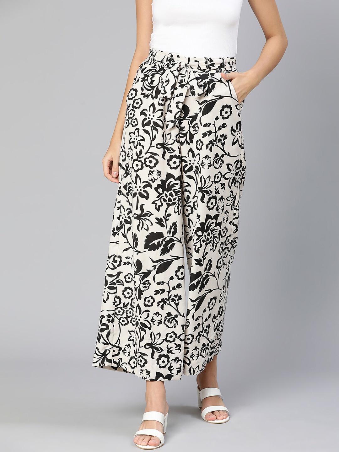 

Oxolloxo Women White Floral Printed Trousers