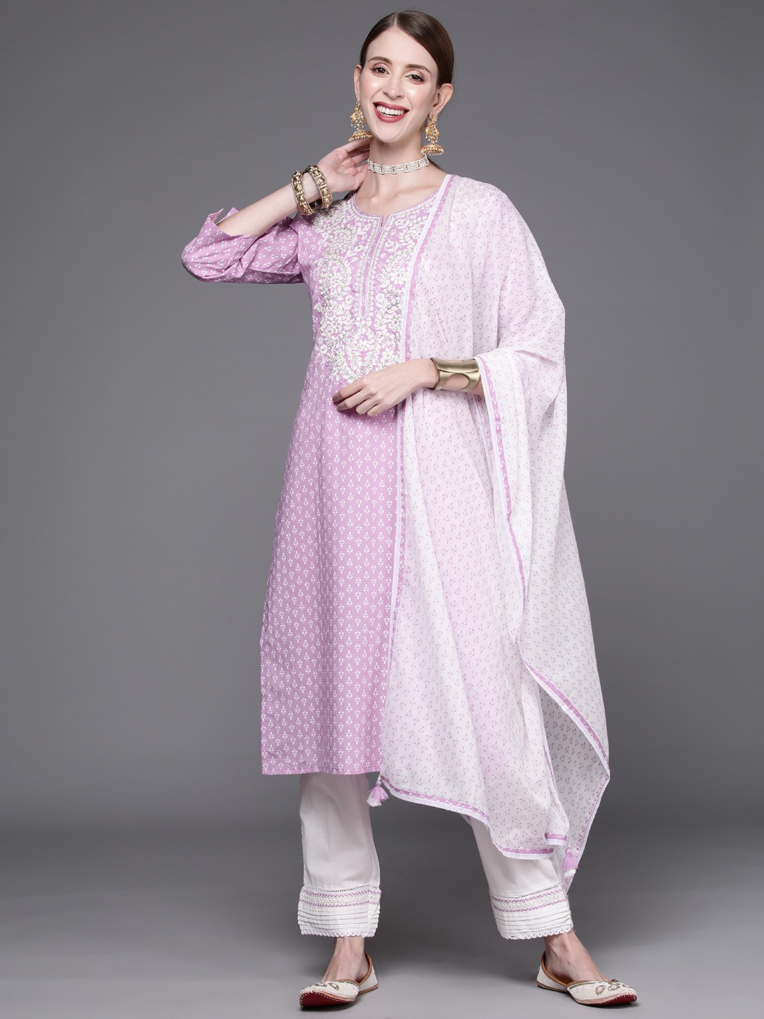 

KSUT Women Lavender & White Printed Thread Work Pure Cotton Kurta with Trousers & Dupatta