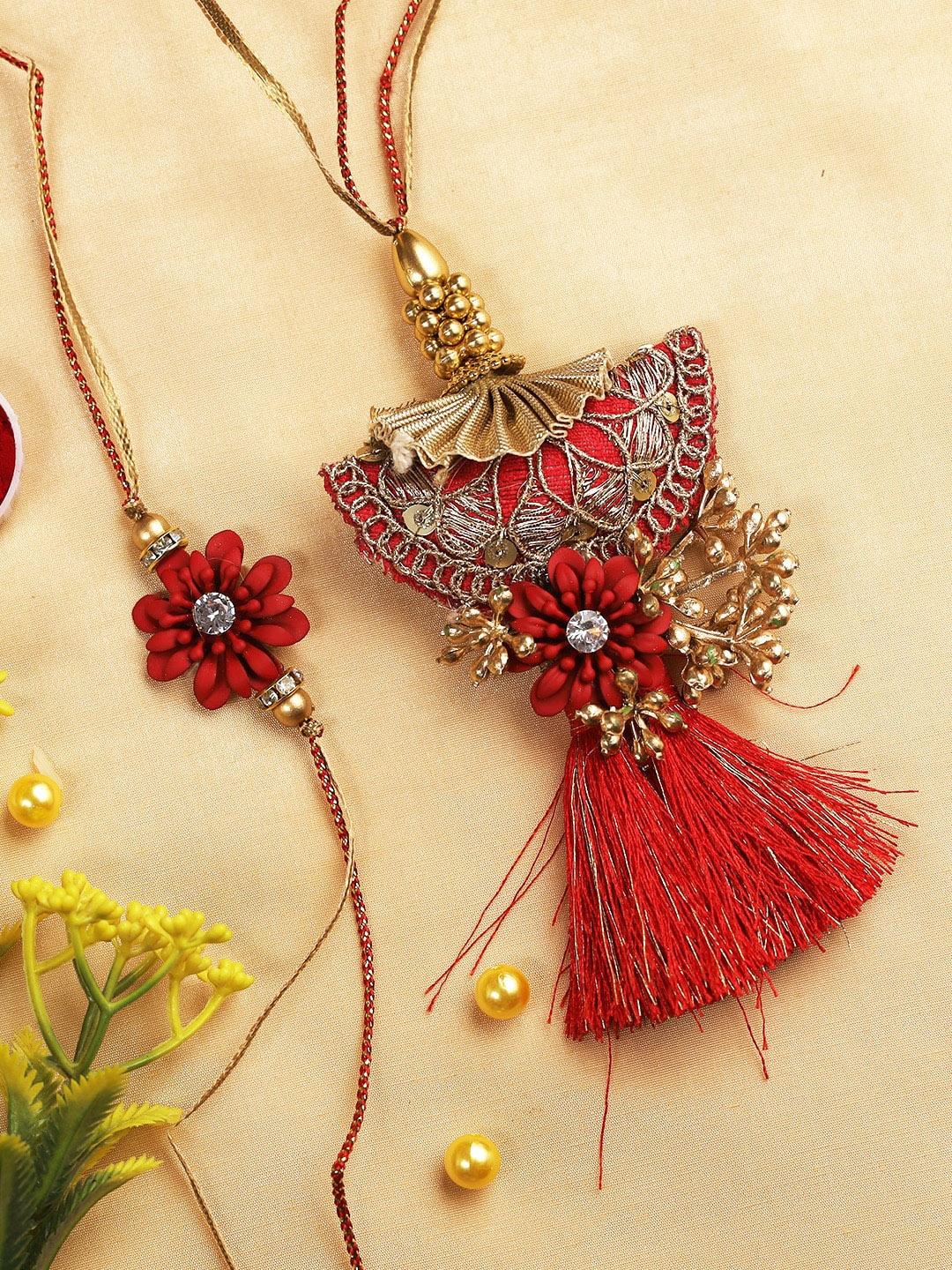

Aapno Rajasthan Set of 2 Red and Gold-Toned Bhaiya Bhabhi Rakhi