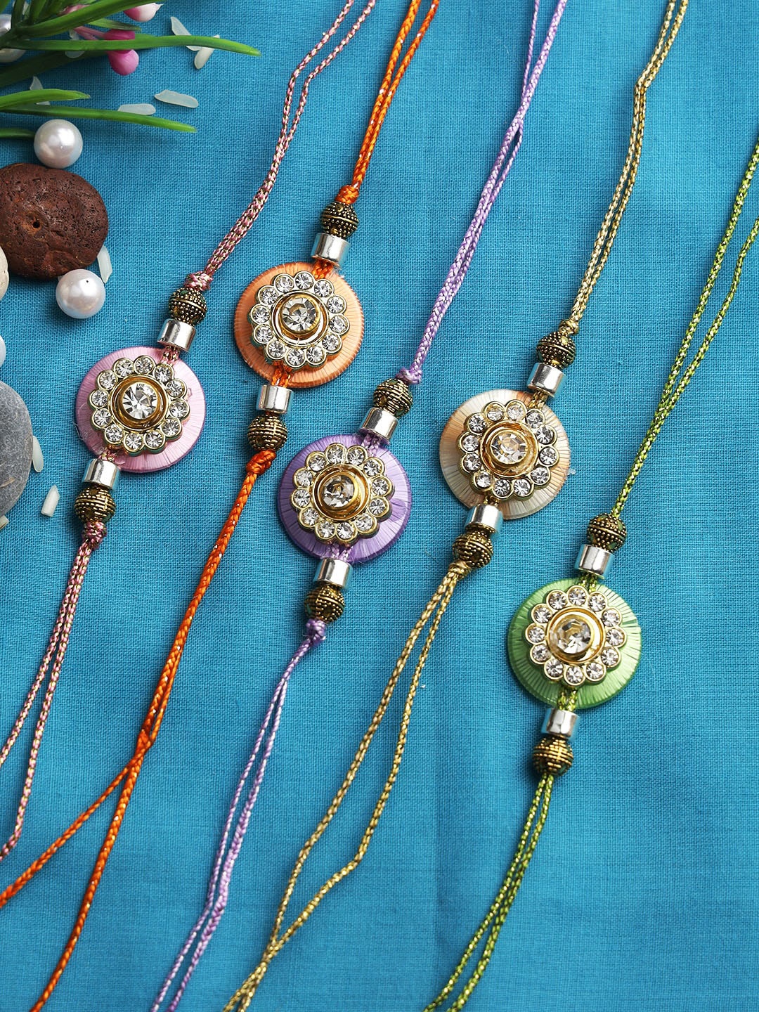 

Aapno Rajasthan Set Of 5 Red & Silver-Toned Beaded Rakhis