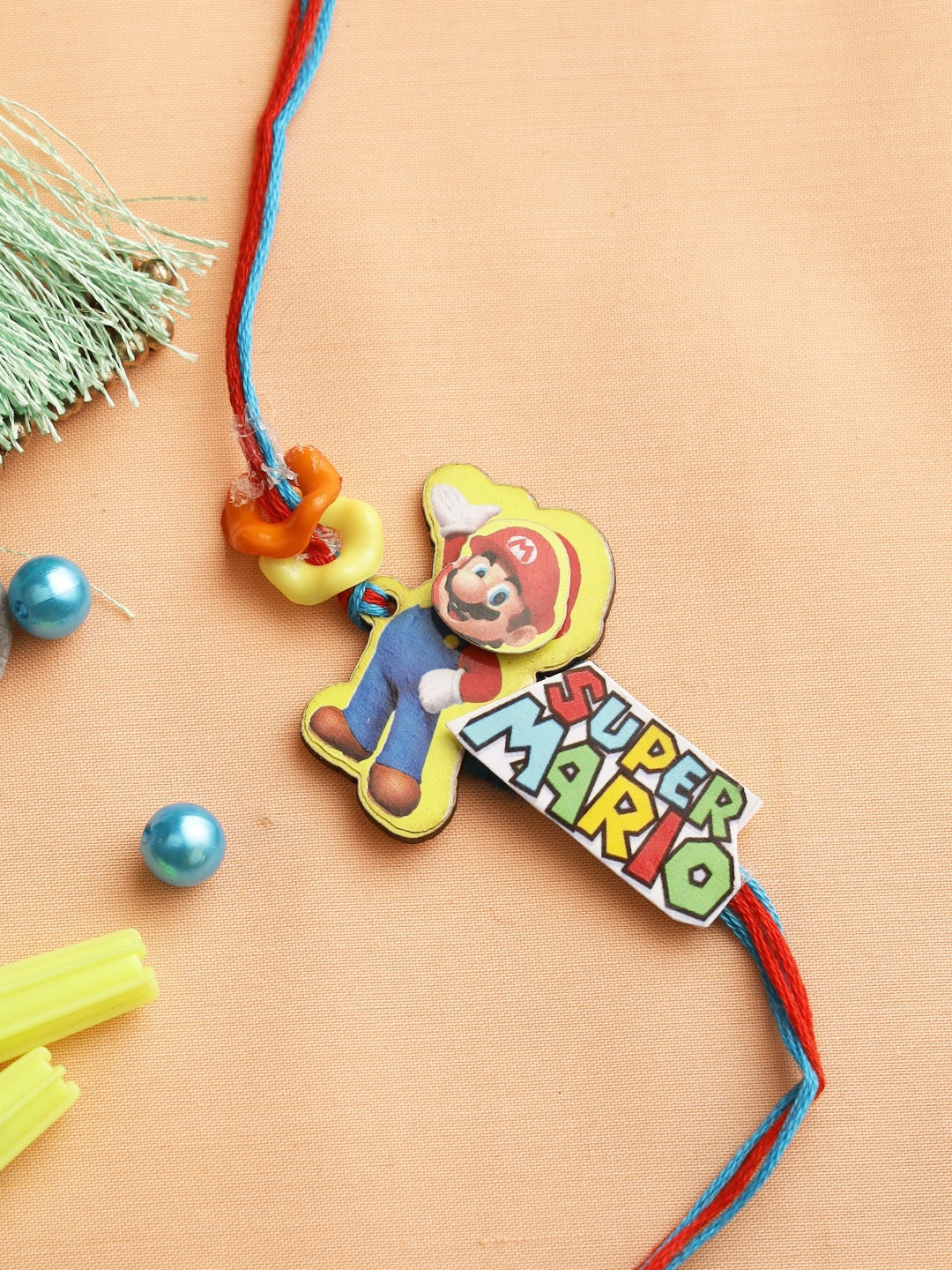 

Aapno Rajasthan Kids Multicolored Mr. Super Mario Rakhi, Multi