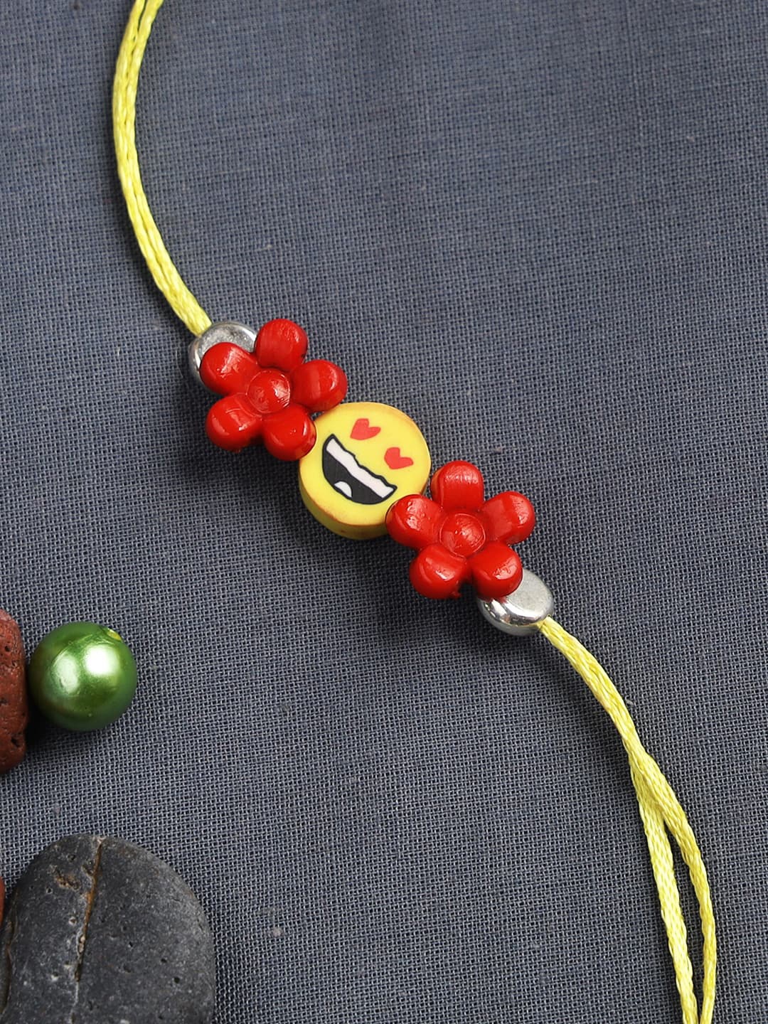 

Aapno Rajasthan Kids Red & Yellow Loving Smiley Rakhi