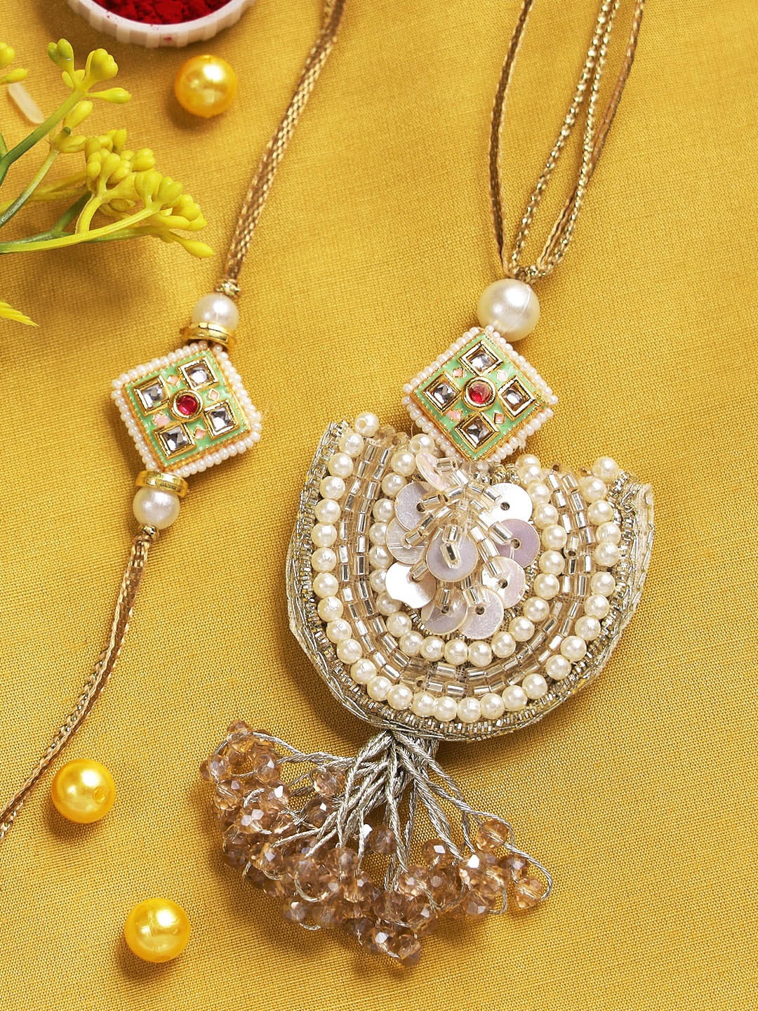 

Aapno Rajasthan Set of 2 Embellished Bhaiya Bhabhi Rakhi Set, Beige