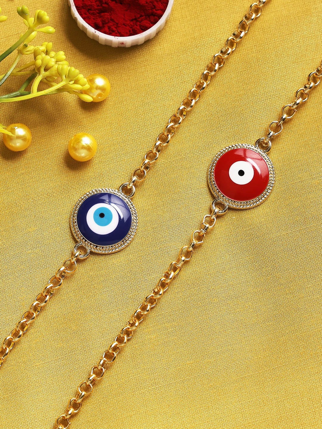 

Aapno Rajasthan Red & Blue Set of 2 Evil Eye Rakhi Bracelet