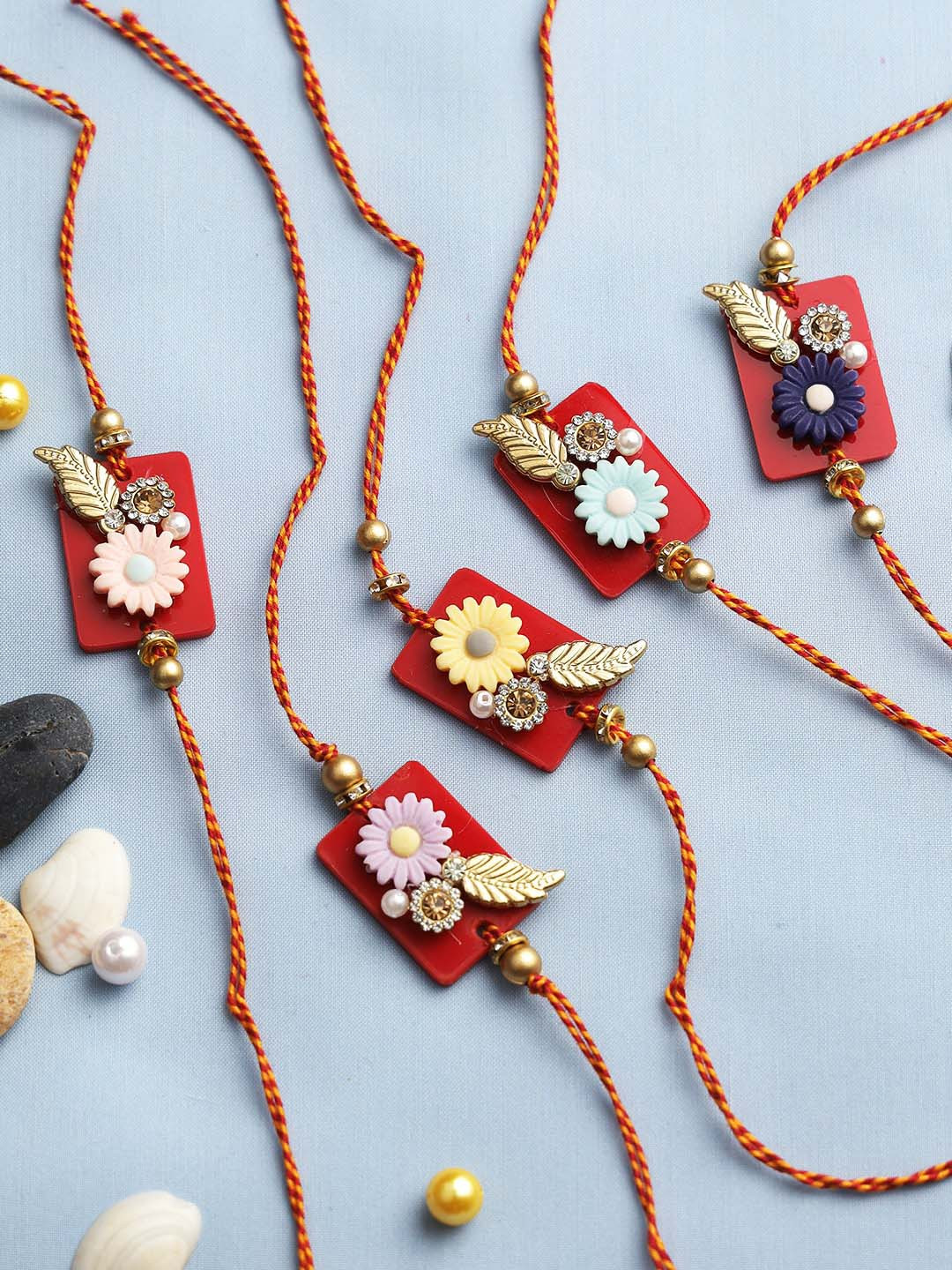 

Aapno Rajasthan Set Of 5 Red & Gold-Toned Studded Rakhis