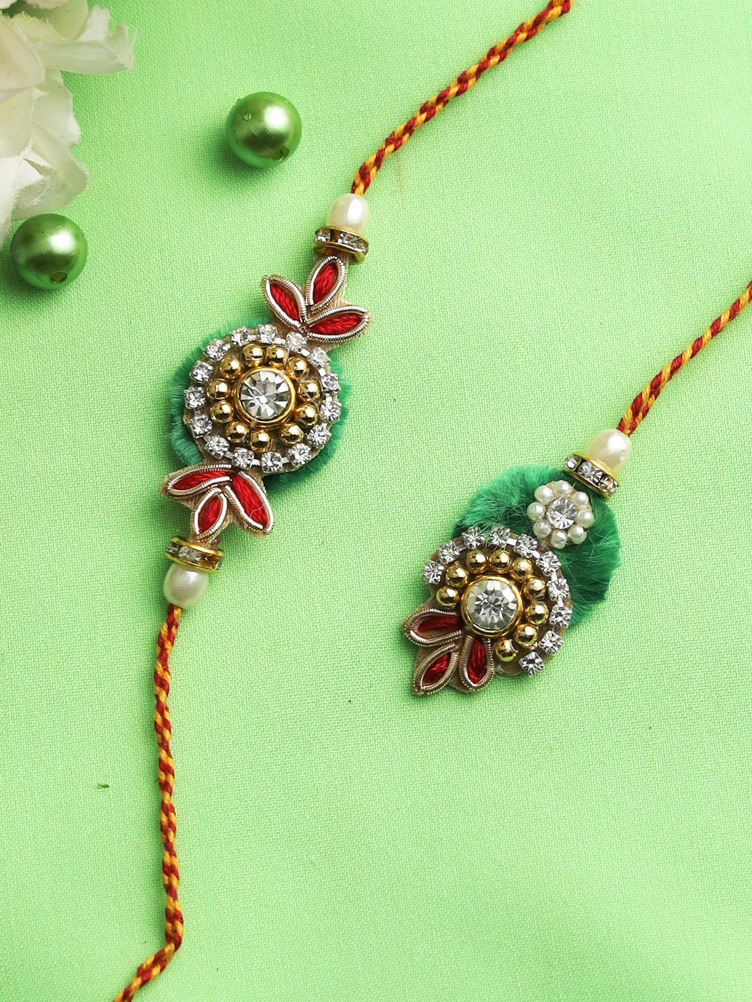 

Aapno Rajasthan Green Bhaiya Bhabhi Rakhi Set