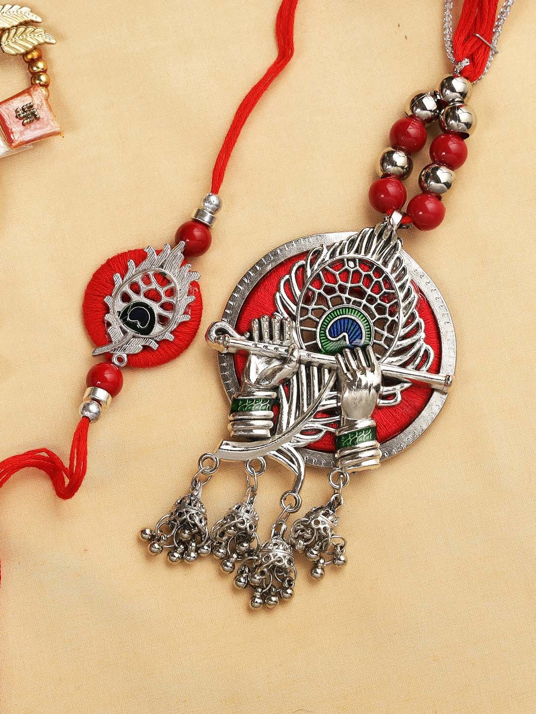 

Aapno Rajasthan Pack Of 2 Silver Ornated Krishna Flute Bhaiya Bhabhi Rakhi Set