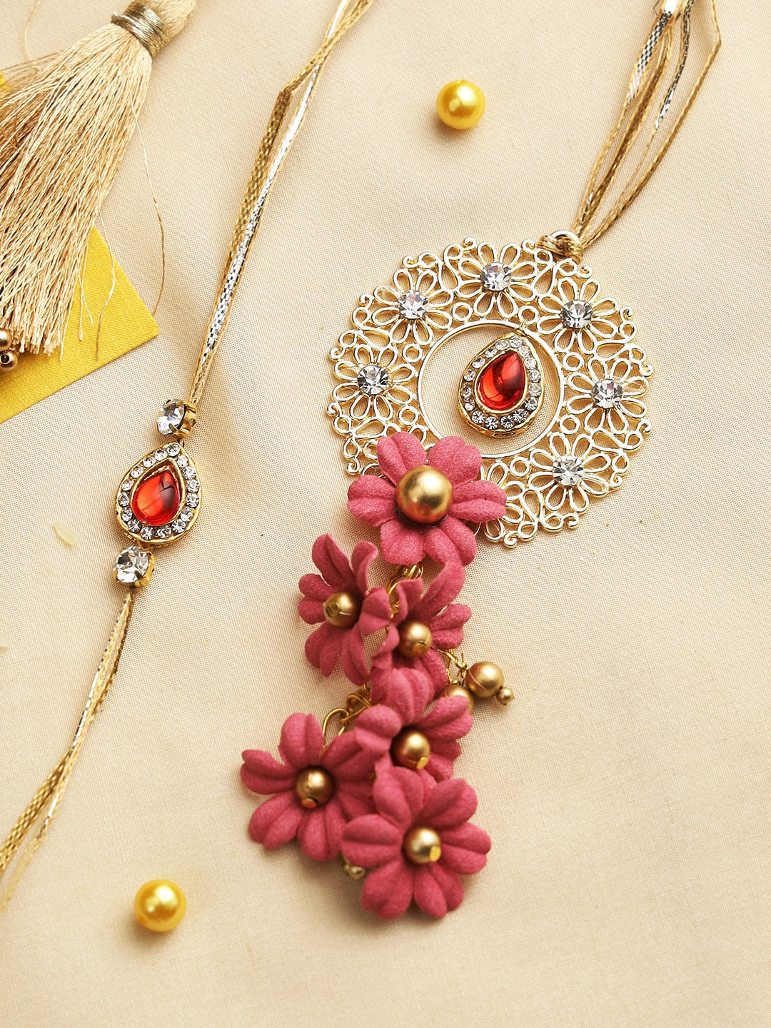 

Aapno Rajasthan Pink & Red Paradise Bhaiya Bhabhi Rakhi Combo