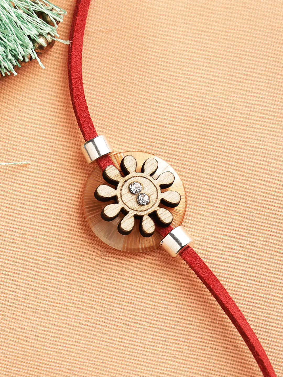 

Aapno Rajasthan Red Floral Traditional Rakhi With Roli Chawal & Card