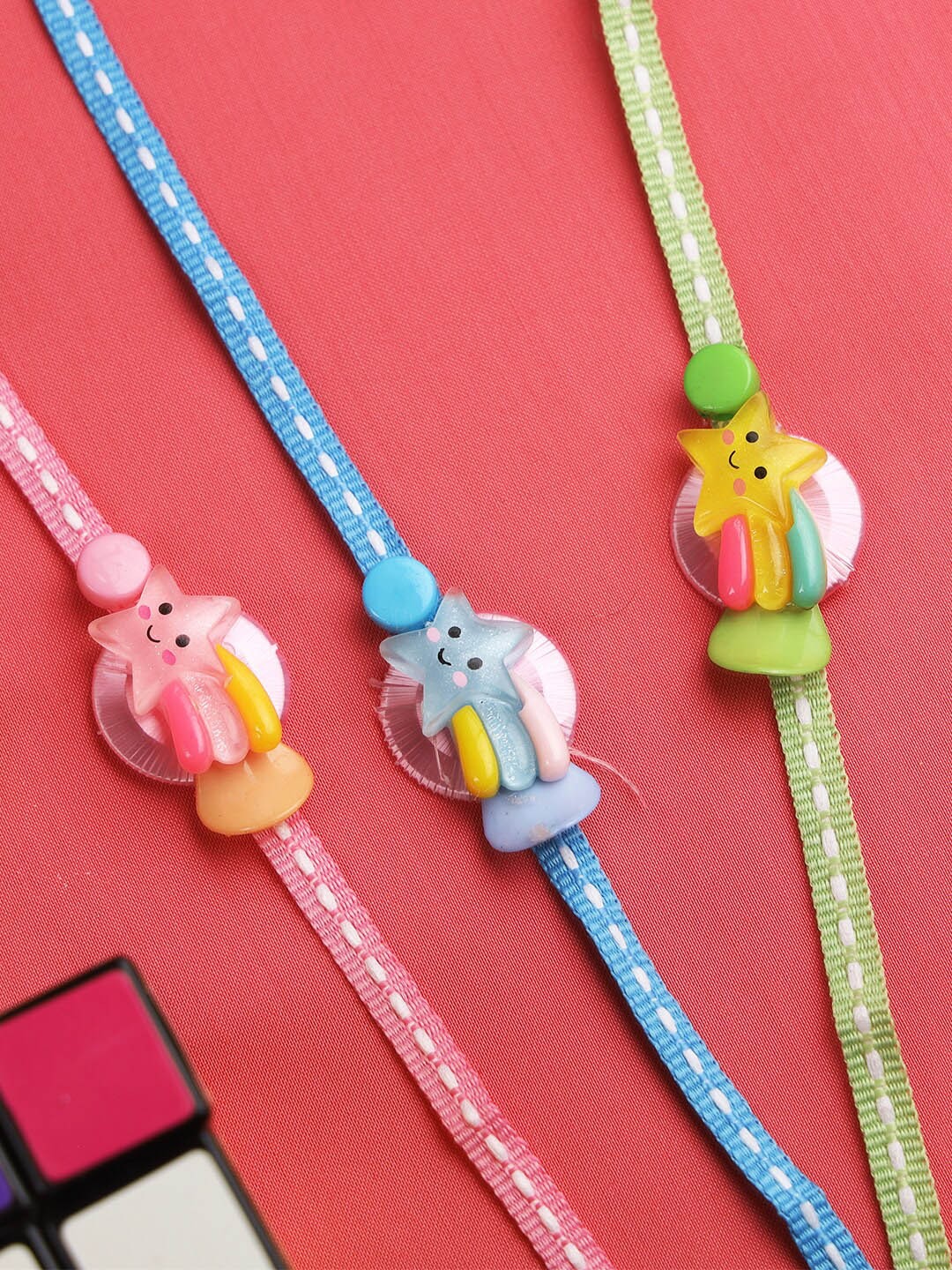

Aapno Rajasthan Pack of 5 Multicoloured Rakhi with Roli Chawal Set, Multi