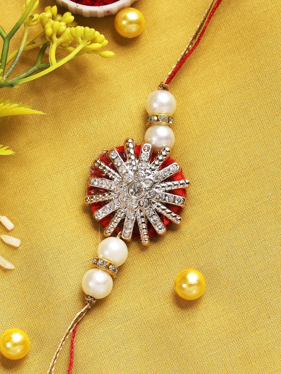 

Aapno Rajasthan Red & Golden Embellished Floral Rakhi with Roli Chawal & Greetings Card