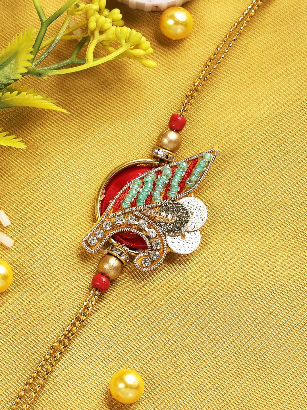 

Aapno Rajasthan Leaf Petal Rakhi with Roli Chawal & Greetings Card, Multi