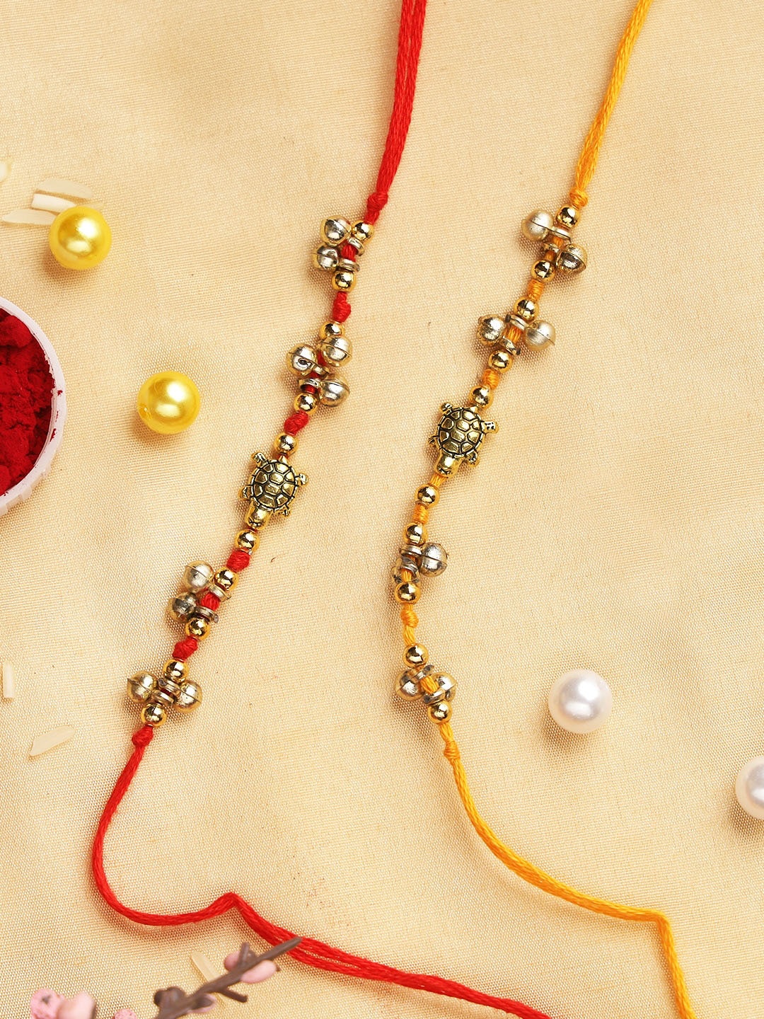 

Aapno Rajasthan Set of 2 Gold-Toned Good Luck Turtle Rakhi