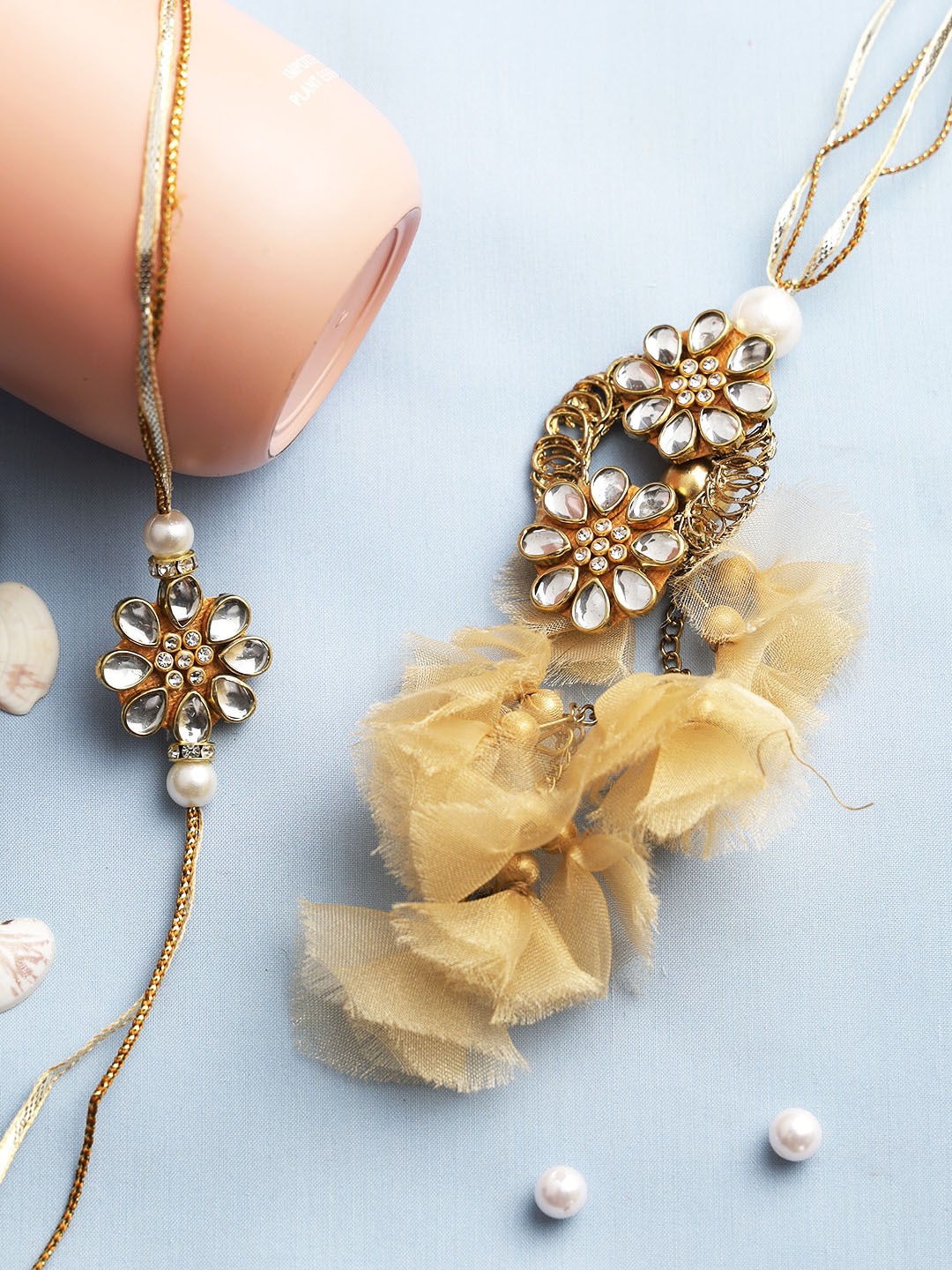

Aapno Rajasthan Set Of 2 Gold-Toned Kundan Bhaiya Bhabhi Rakhis
