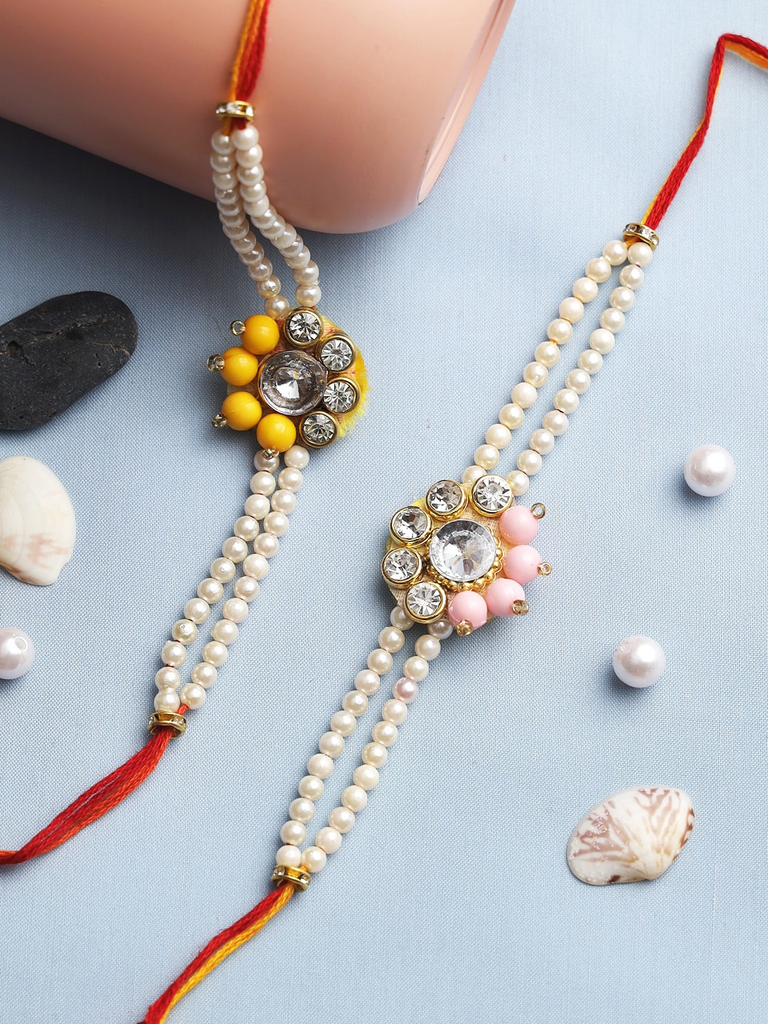 

Aapno Rajasthan Set of 2 Fusion of Diamond and Beads Rakhi, Yellow