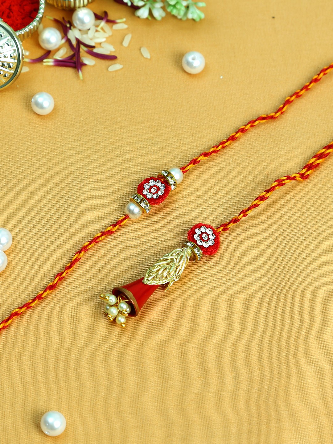 

Aapno Rajasthan Red & Golden Rakhi with Roli Chawal & Greetings Card