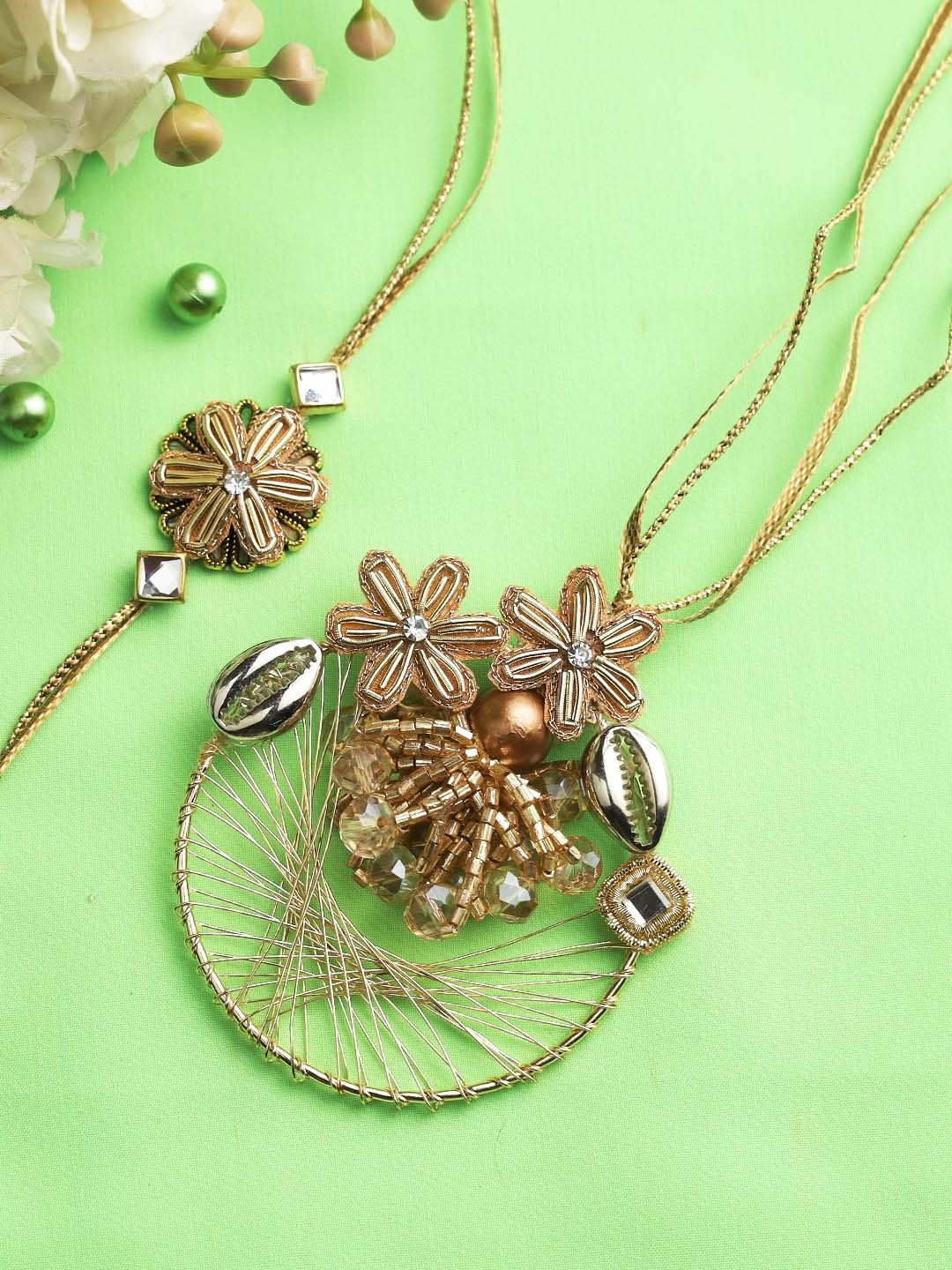 

Aapno Rajasthan Gold-Toned Elegant Shell & Sequin Work Bhabiya Bhabhi Rakhi Set
