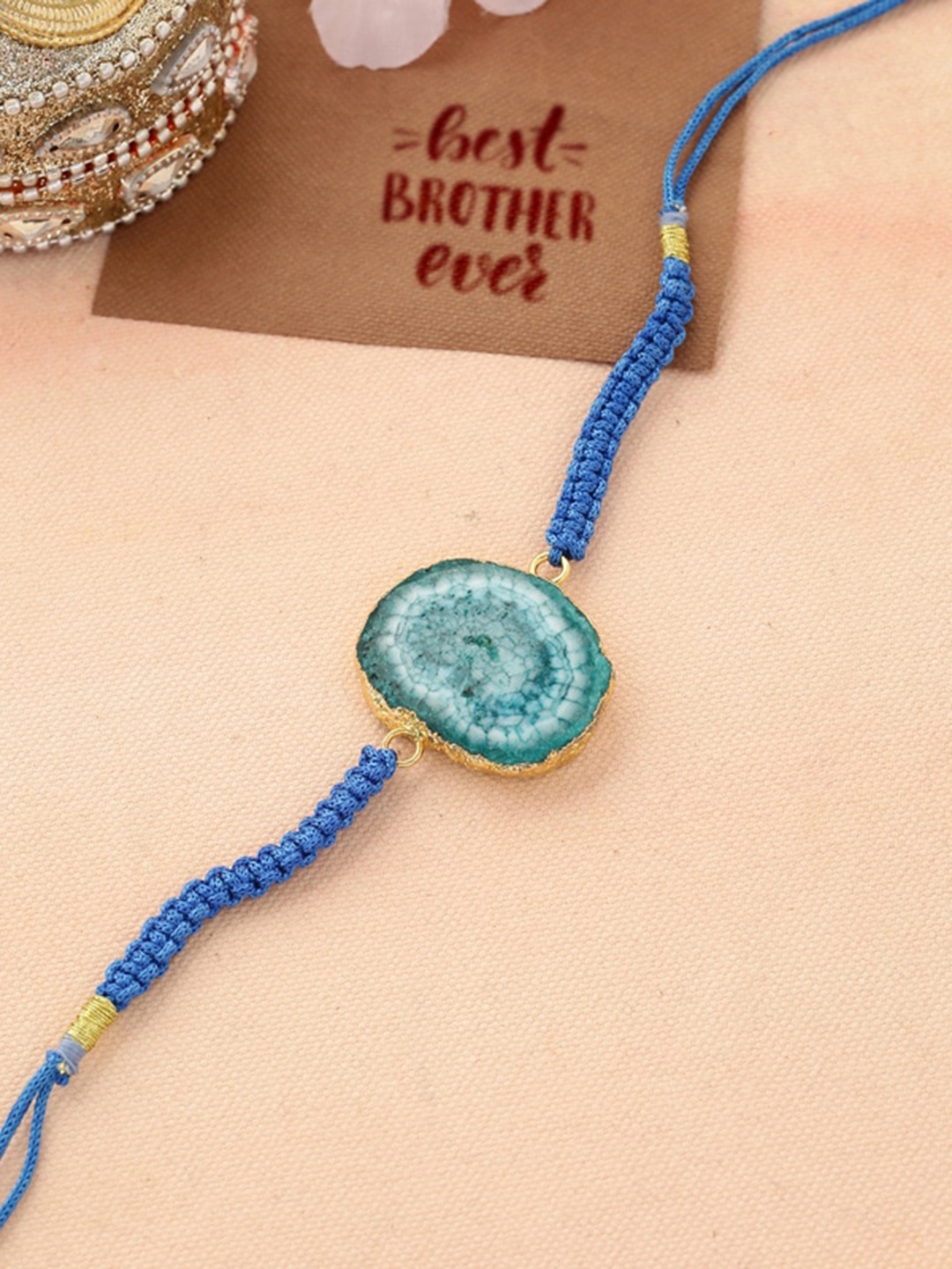 

Shoshaa Gold & Blue Agate stone Single Bhai Rakhi