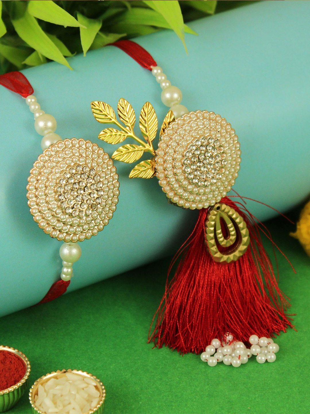

TIED RIBBONS Red Bhaiya Bhabhi Lumba Floral Rakhi Gift Set with Card & Roli Chawal, Pink