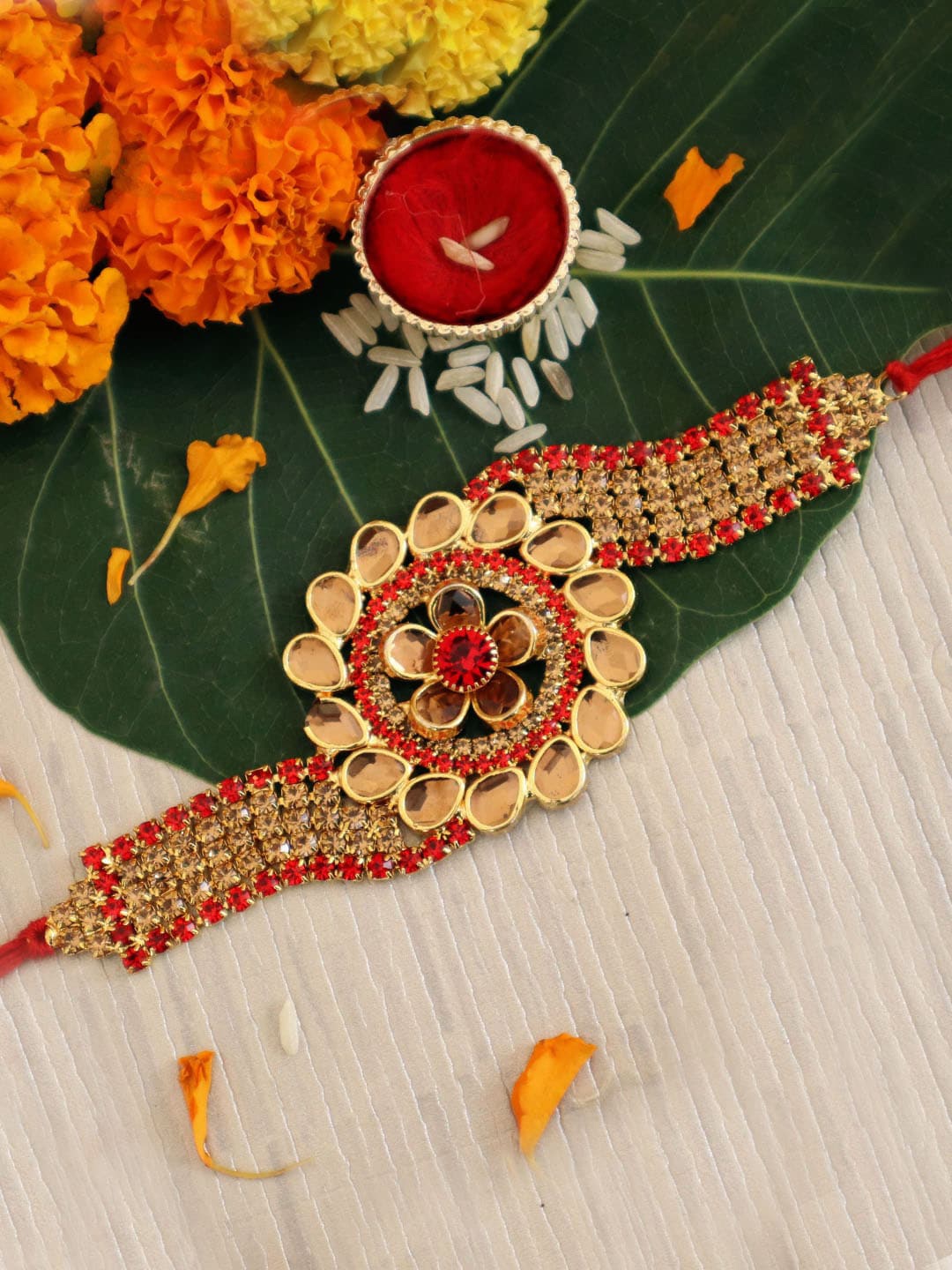 

TIED RIBBONS Designer Stoned-Studded Floral Rakhi with Card & Roli Chawal, Multi