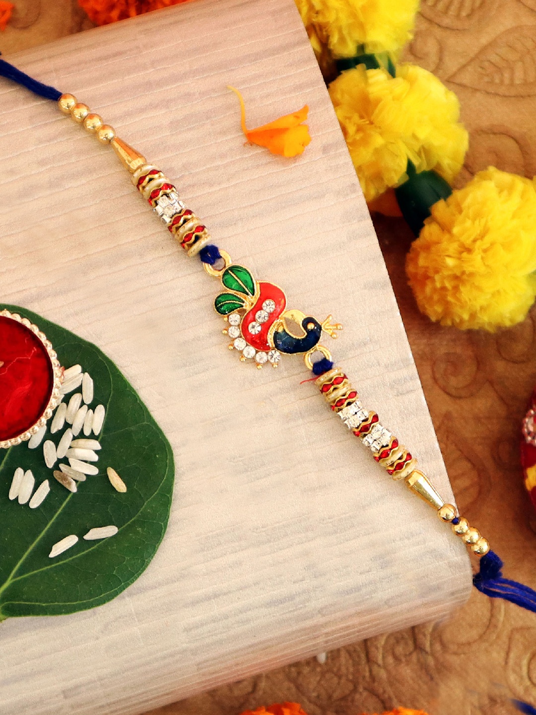 

TIED RIBBONS Premium Peacock Bhai Rakhi with Card & Roli Chawal Gift Set, Multi