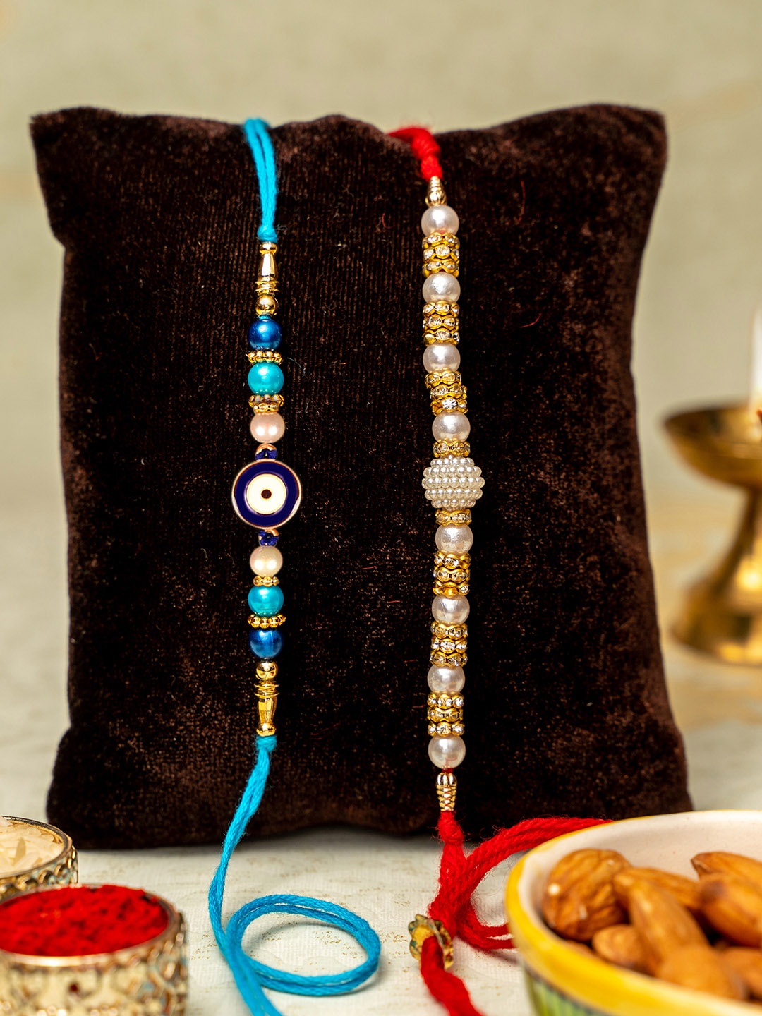 

TIED RIBBONS Set of 2 Designer Evil Eye Rakhi with Card & Roli Chawal, Multi