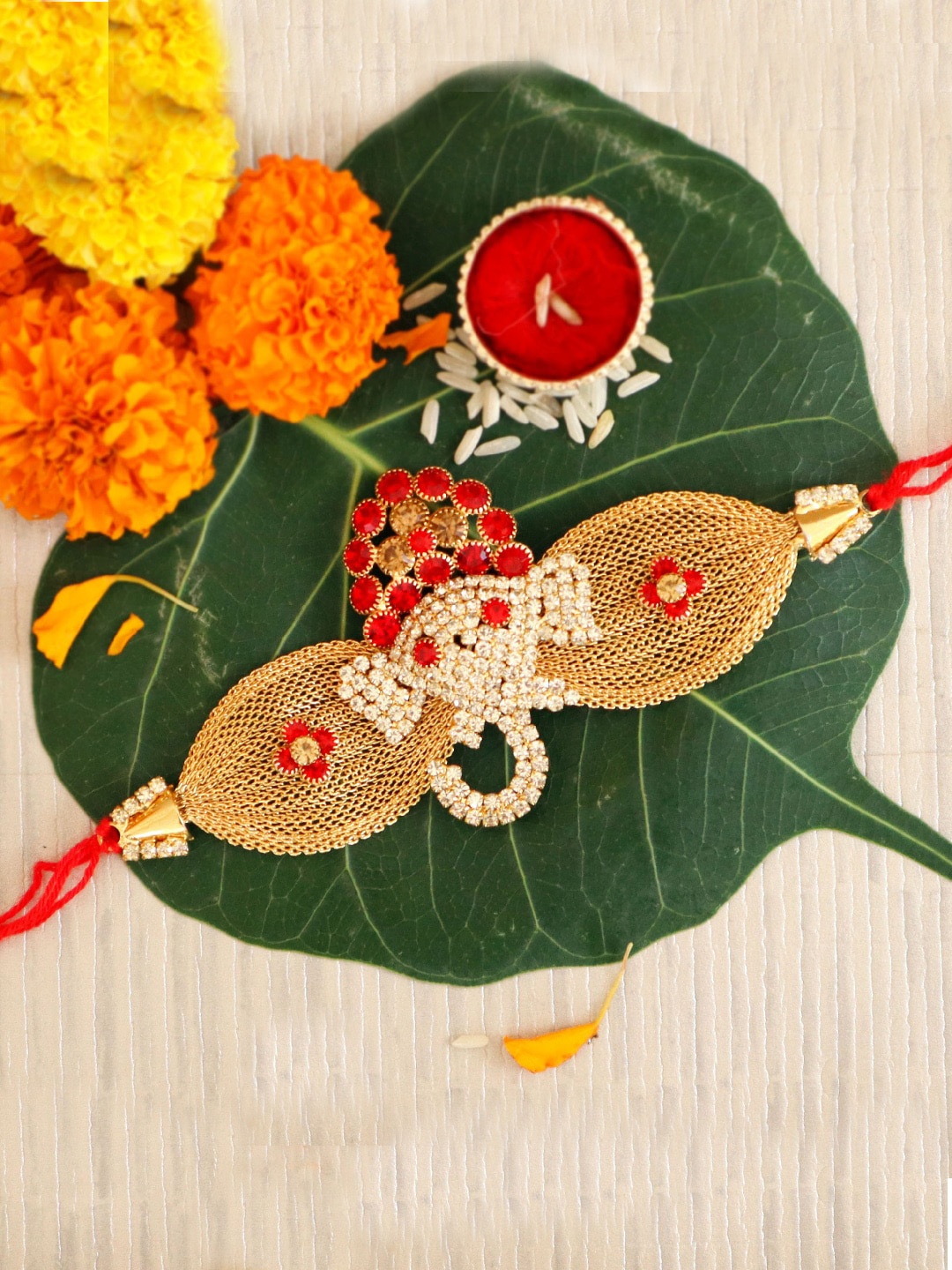 

TIED RIBBONS Men Designer Stoned-Studded Ganesha Rakhi with Card & Roli Chawal, Multi