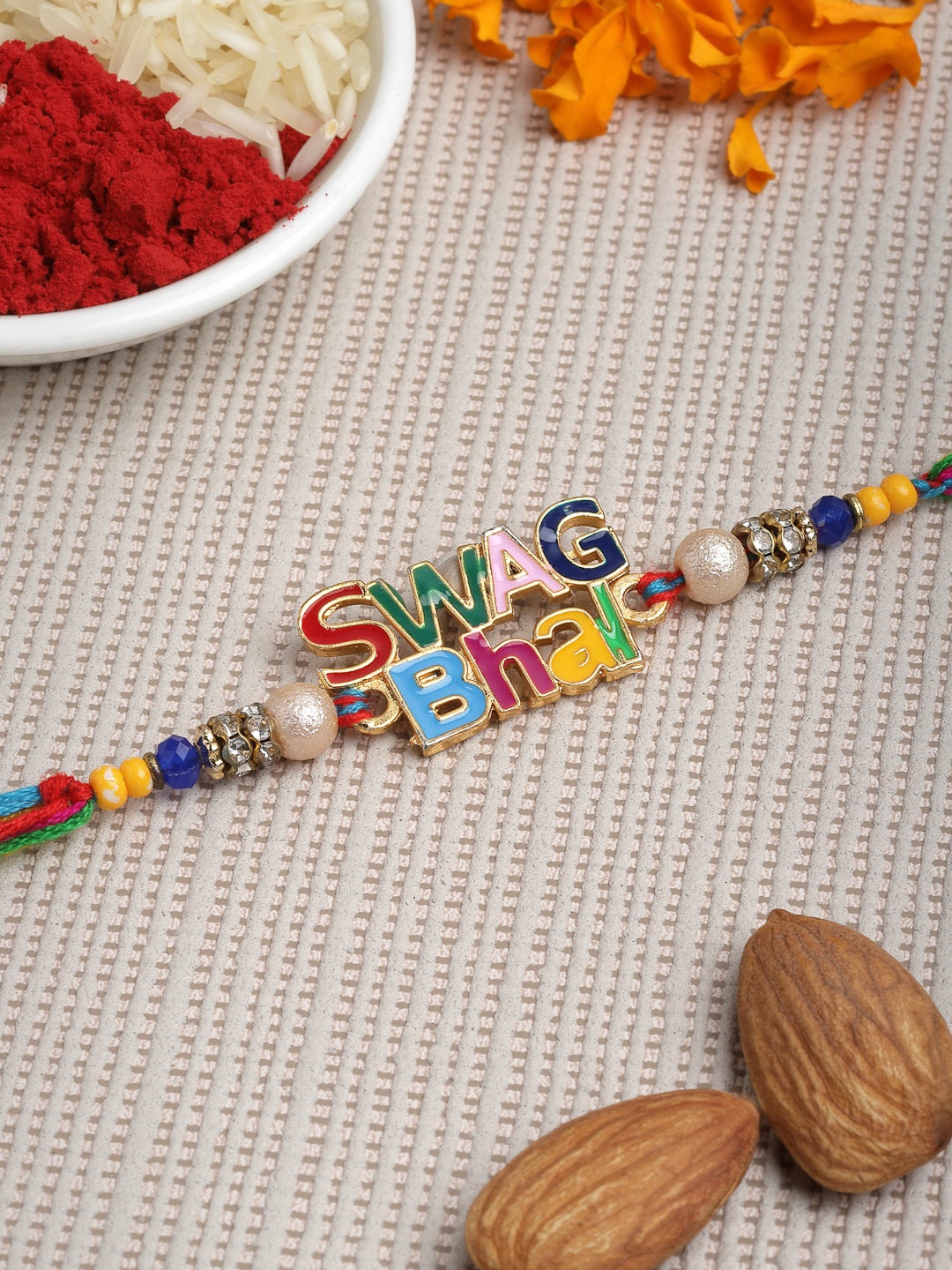 

PANASH Multicoloured SWAG BHAI Handcrafted Rakhi with Best Bro Gift Stand & Roli Chawal, Multi