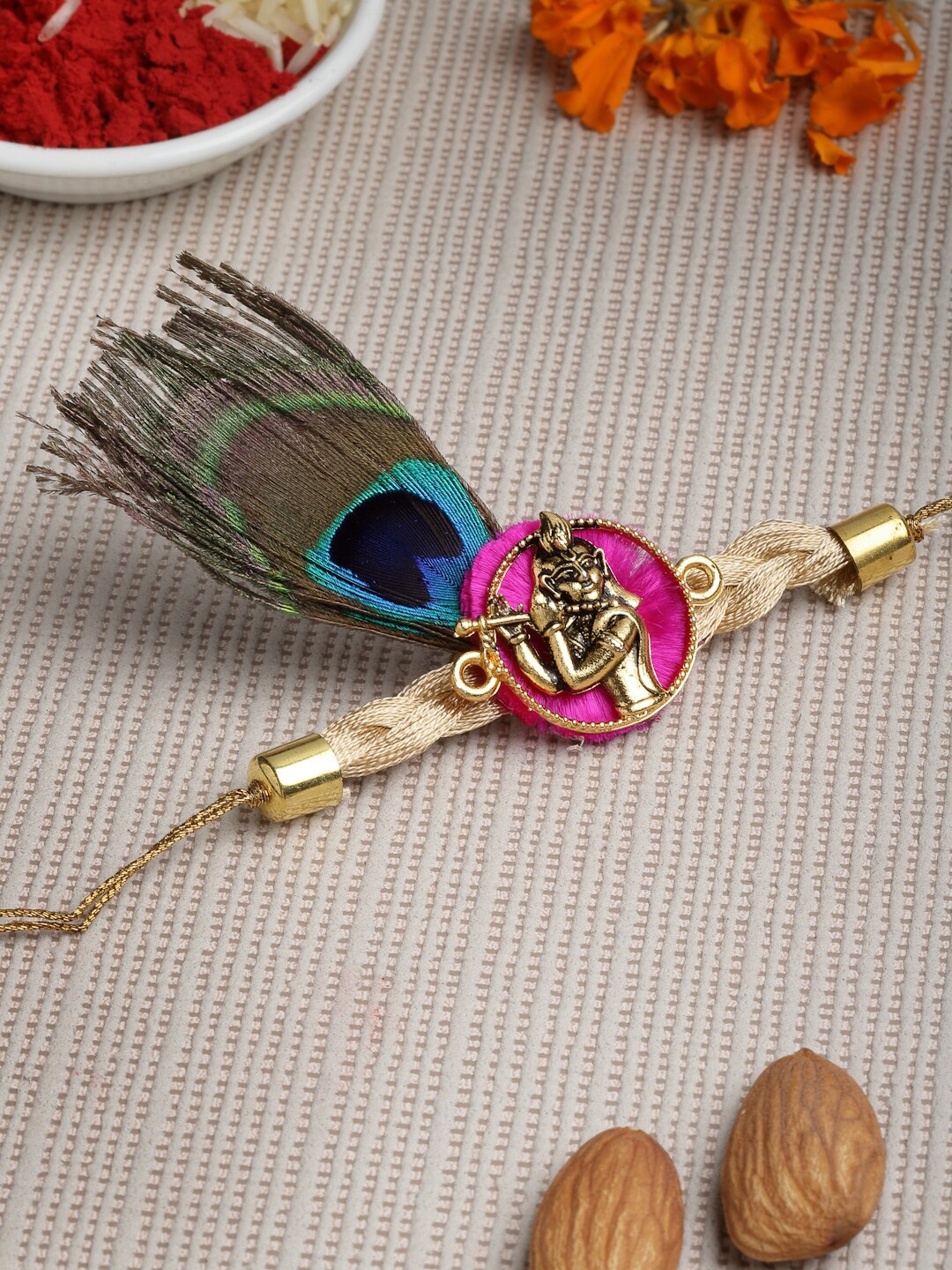 

PANASH Men Gold-Toned Shri Krishna Designer Rakhi with Roli Chawal