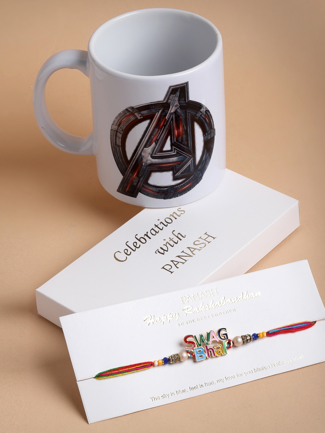 

PANASH Multicoloured SWAG BHAI Handcrafted Rakhi with Avengers Mug Gist Set, Multi