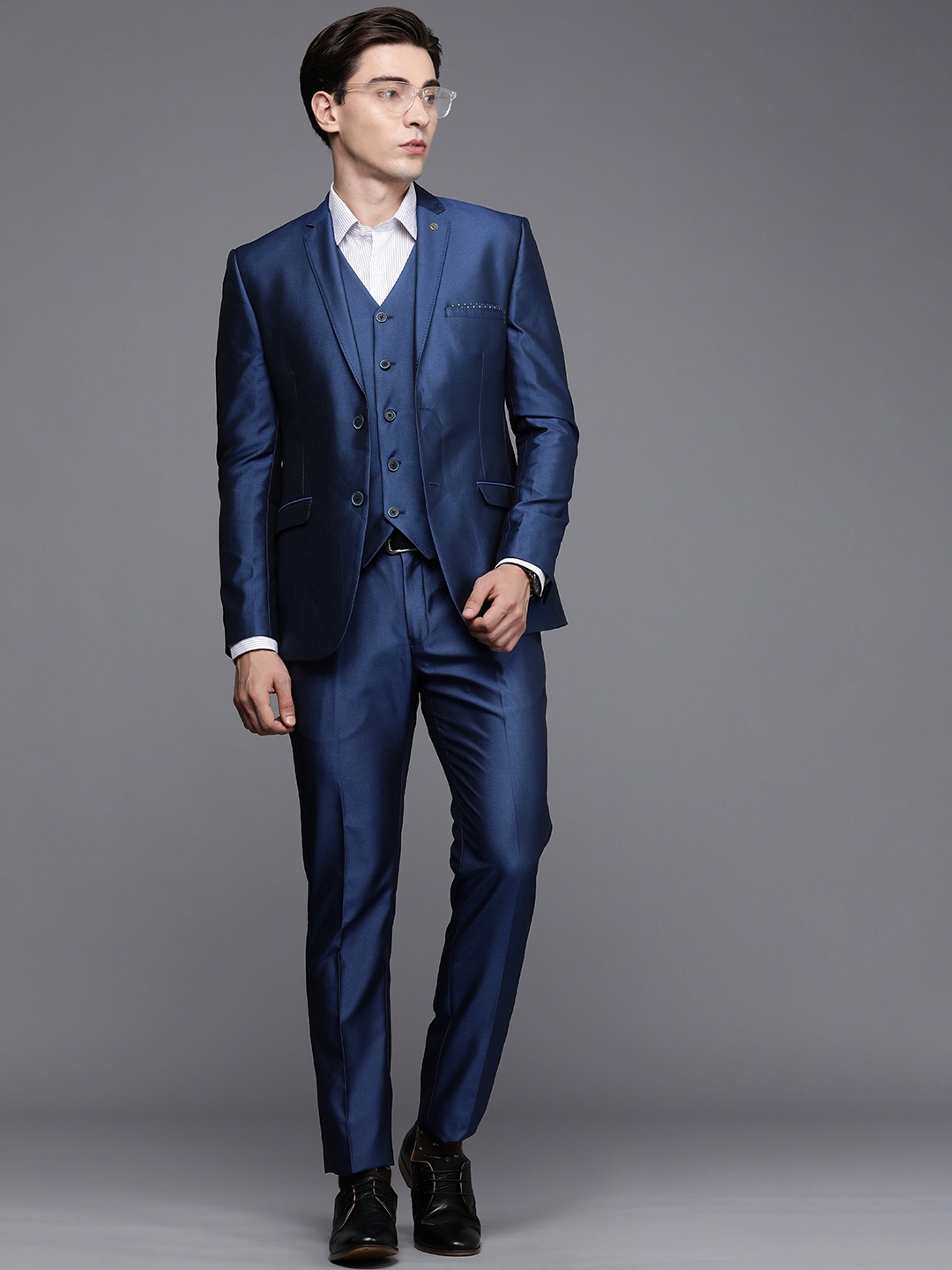 

Theme Men Blue Self Design Single-Breasted Slim Fit Notched Collar Formal Suit