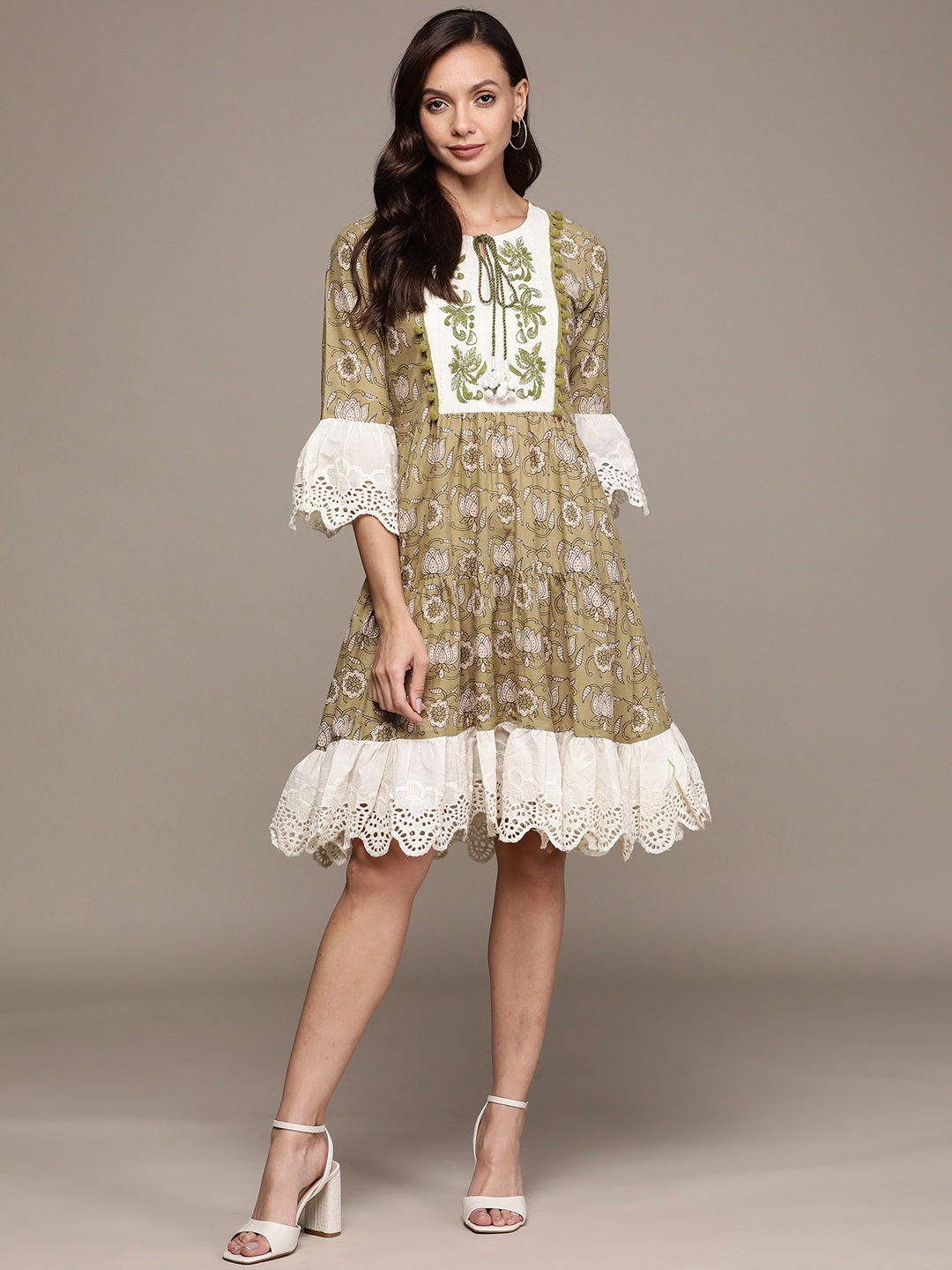 

Ishin Green & Off White Ethnic Motifs Embroidered Tie-Up Neck A-Line Dress