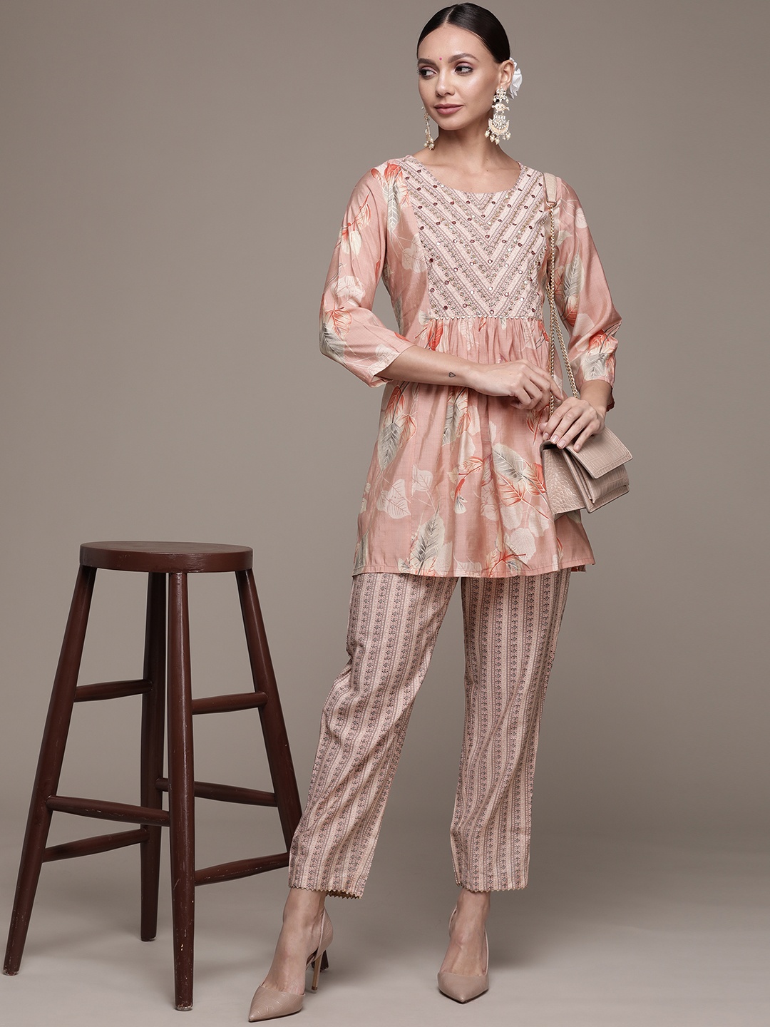 

Ishin Women Peach-Coloured Floral Embroidered Beads and Stones Kurti with Trousers