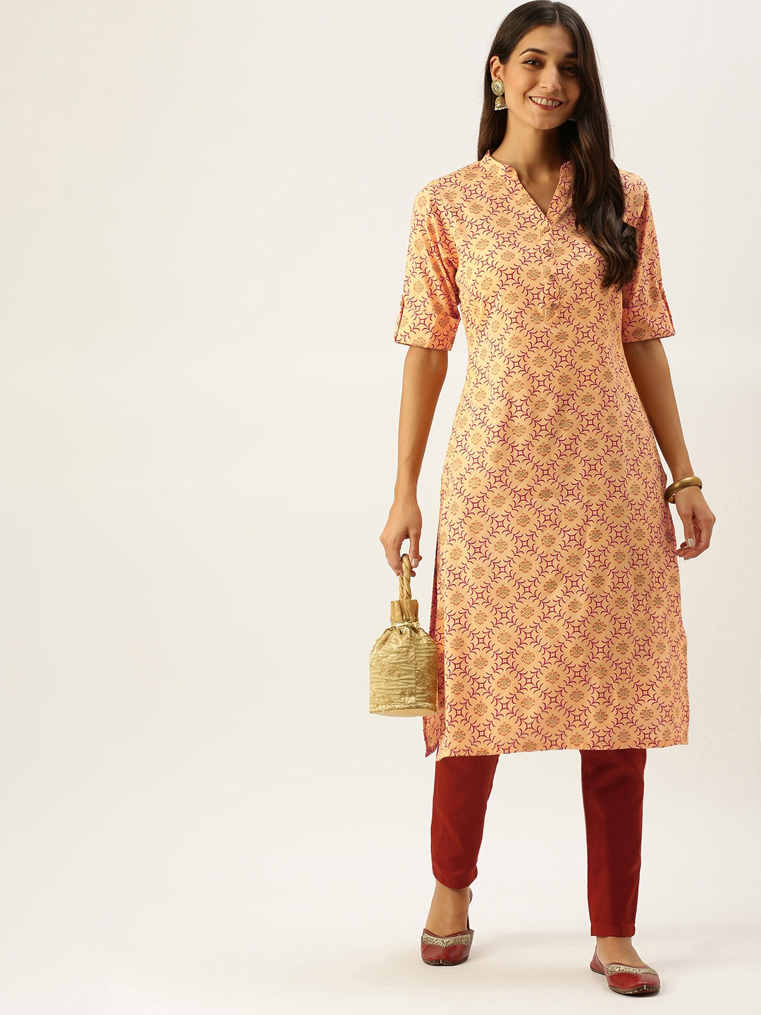 

Vedic Women Orange Ethnic Motifs Printed Kurta with Trousers