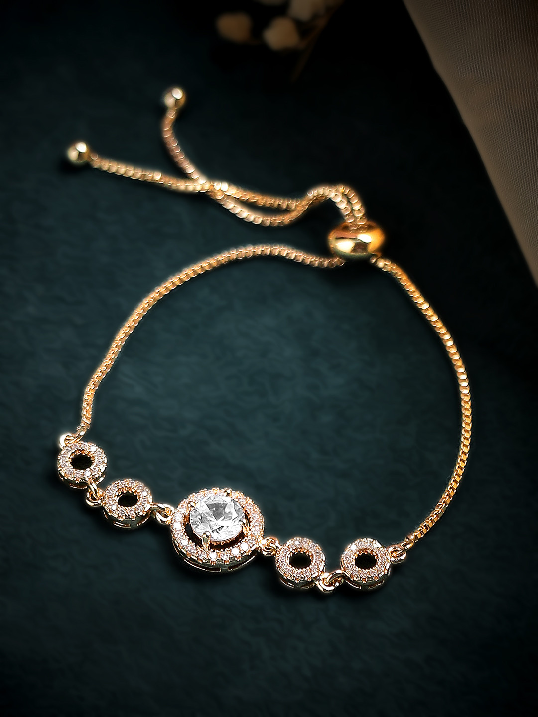 

Rubans Women Gold-Toned & White American Diamond Gold-Plated Link Bracelet