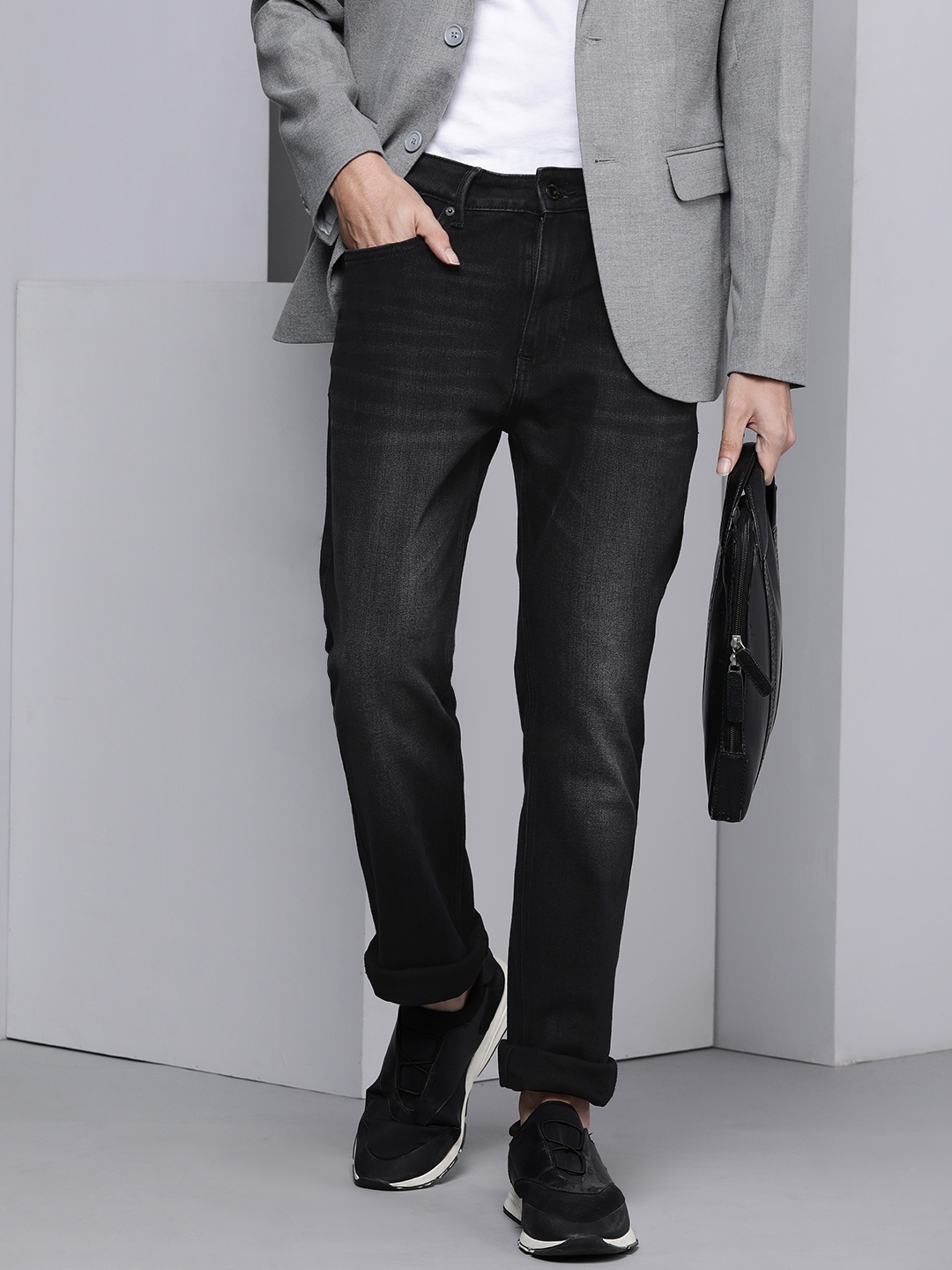

Kenneth Cole Men Charcoal Grey Ligh Fade Slim Fit Mid Rise Rapido Jeans