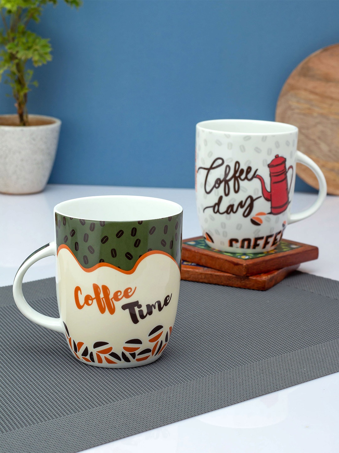 

CLAY CRAFT White & Green Printed Ceramic Glossy Mugs Set of Cups and Mugs