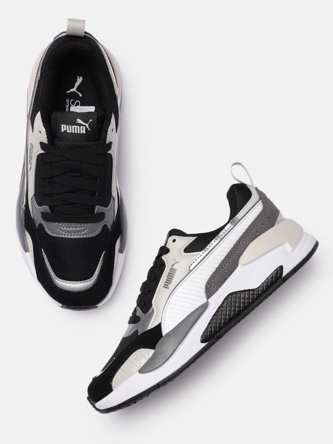 

Puma Unisex Black Solid Sneakers