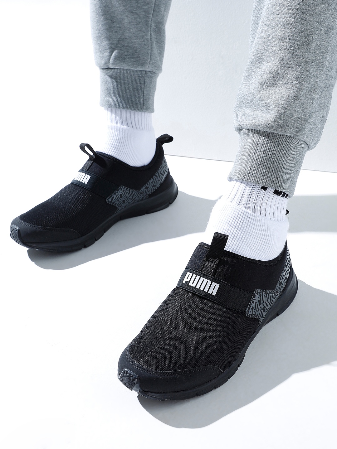 

Puma Men Black Solid Regular Knit Slip-On Sneakers With Brand Logo Print Detail