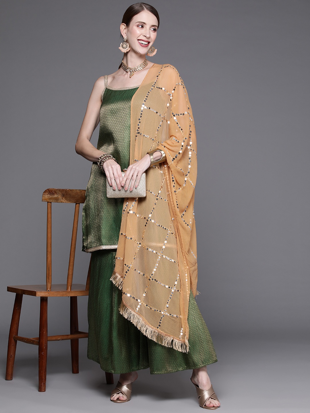 

Varanga Women Green & Golden Kurta with Sharara & With Dupatta