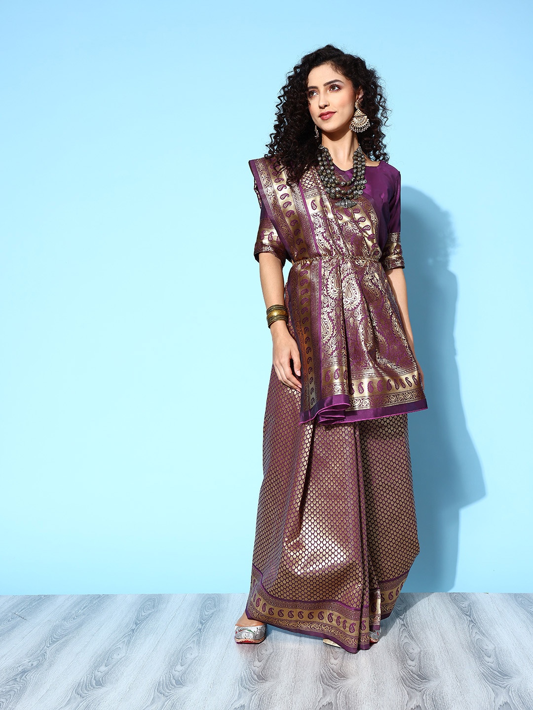 

Saree mall Ethnic Motifs Saree with Woven Design Border, Purple