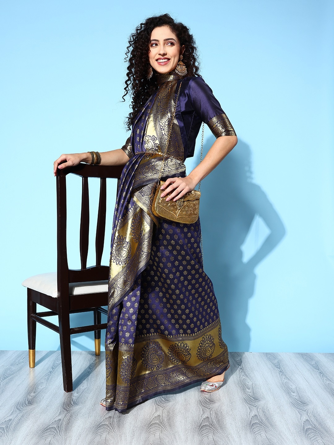 

Saree mall Ethnic Motifs Saree with Woven Design Border, Navy blue