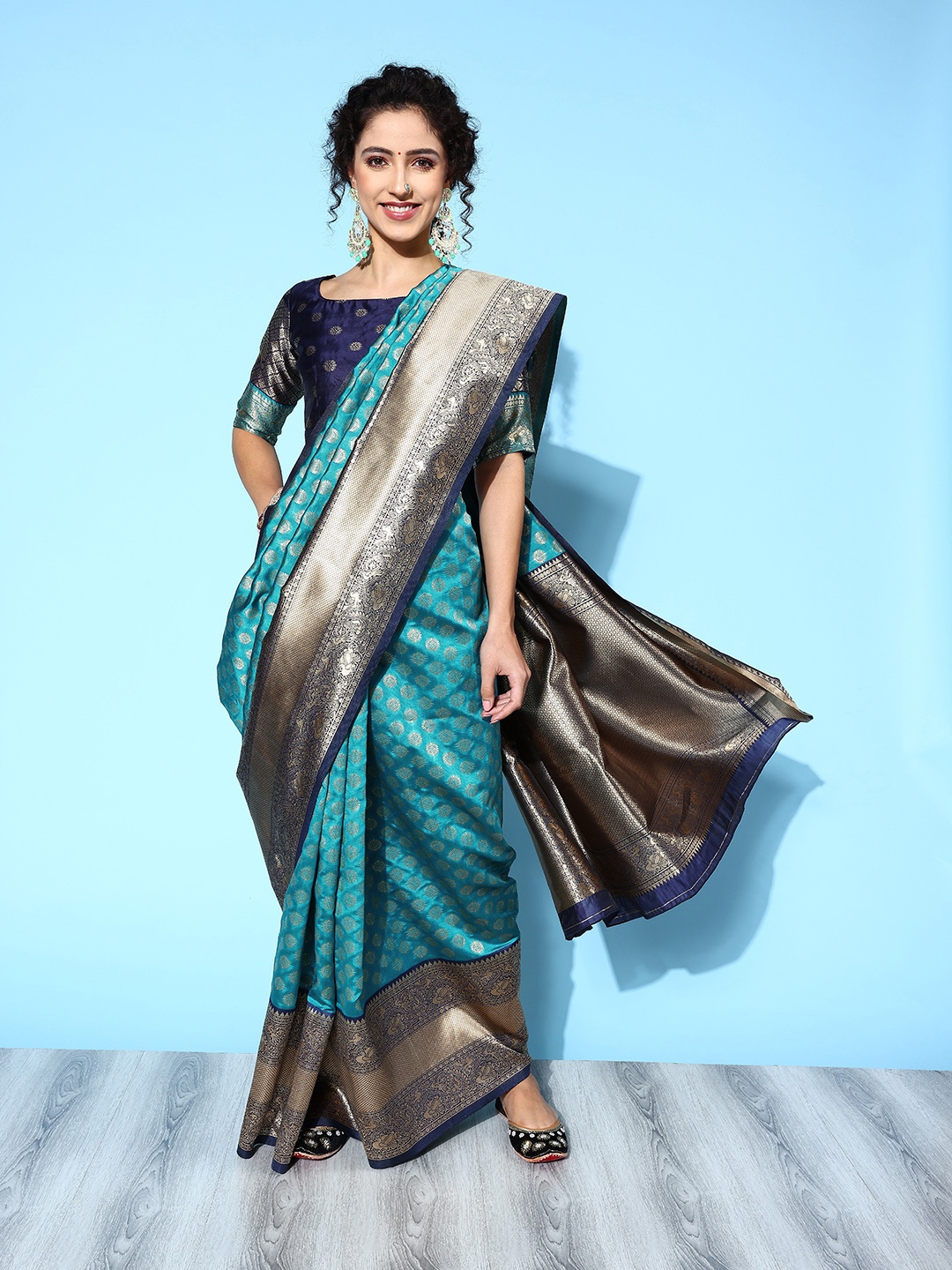 

Saree mall Ethnic Motifs Saree with Woven Design Border, Blue