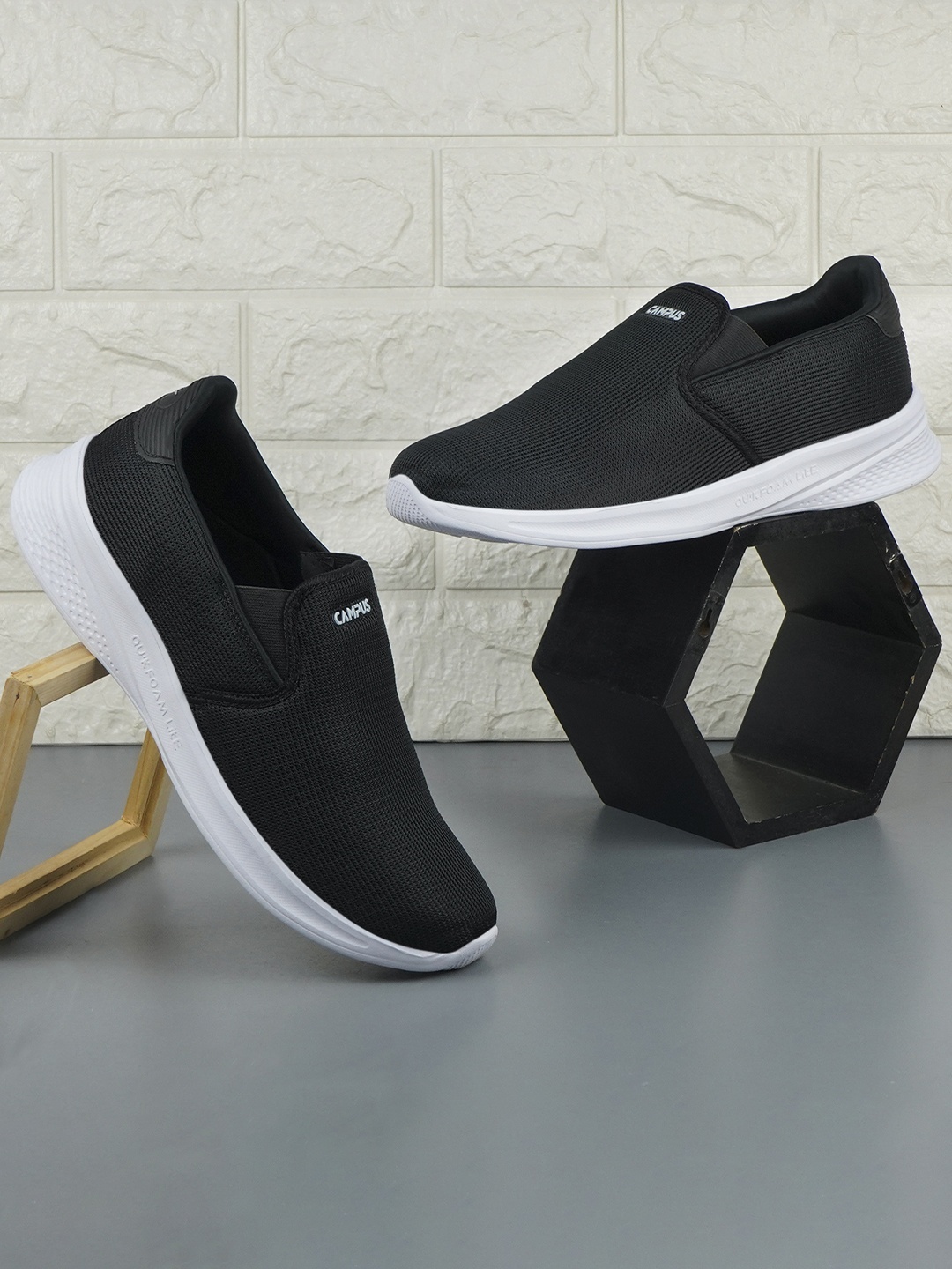 

Campus Men Black Mesh Walking Shoes