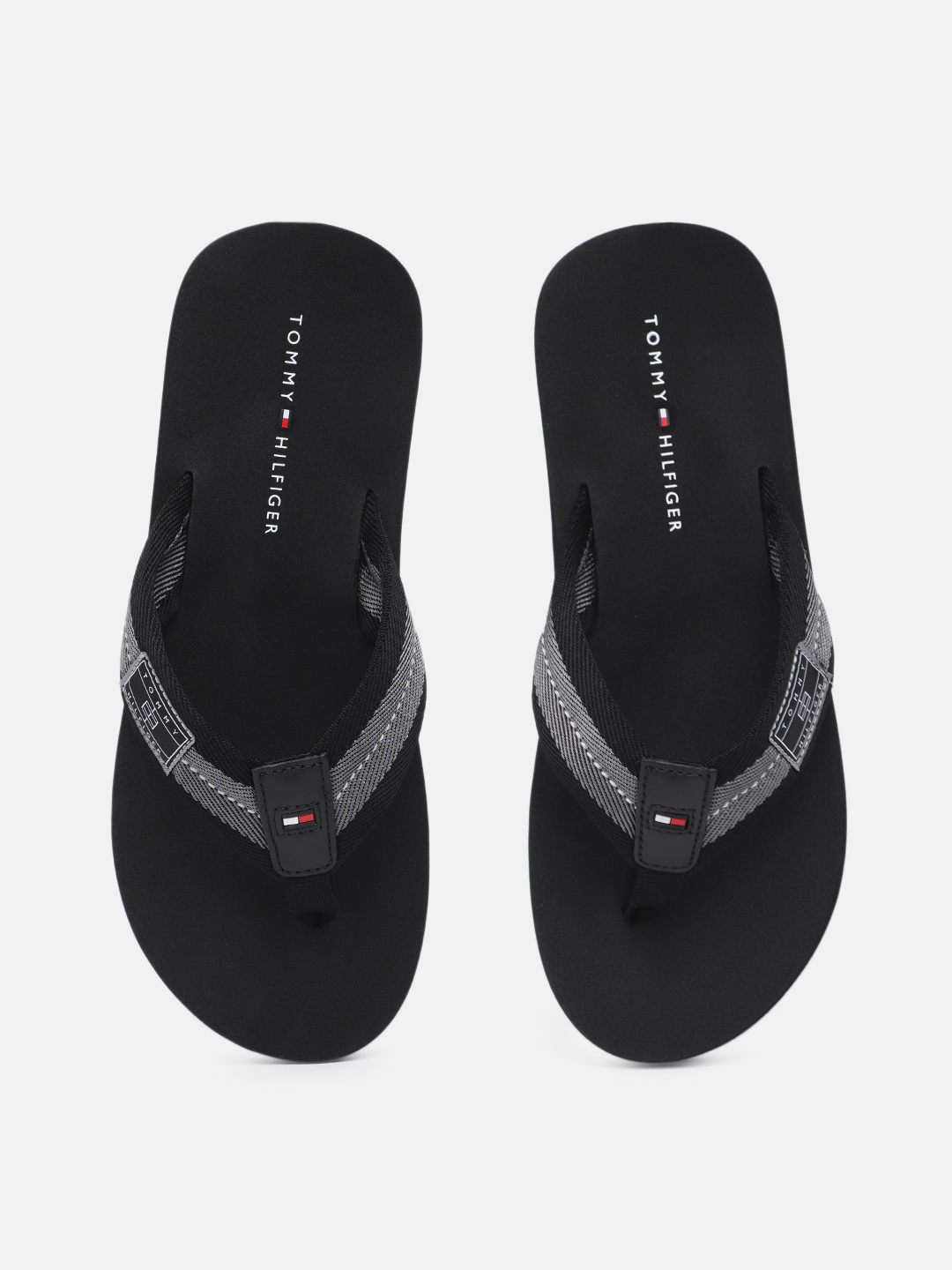 

Tommy Hilfiger Men Black Solid Thong Flip-Flops
