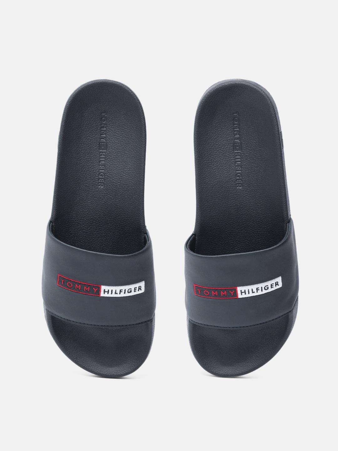 

Tommy Hilfiger Men Navy Blue Embroidered Sliders