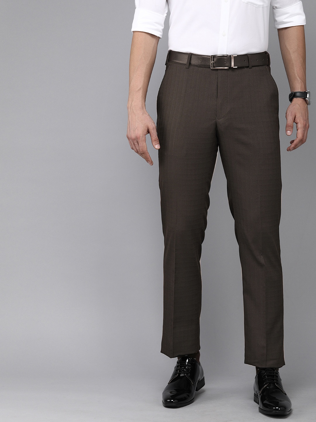 

Park Avenue Men Dark Brown Solid Mid-Rise Formal Trousers