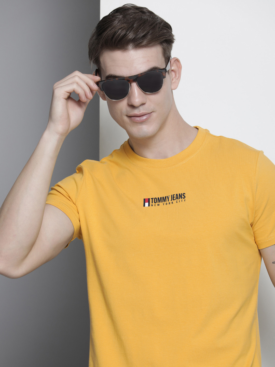 

Tommy Hilfiger Men Mustard Yellow Brand Logo Printed Slim Fit T-shirt
